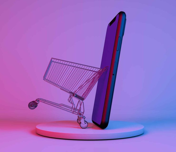 Shopping cart moving out from mobile phone. 3D rendering, Realistic close up shopping cart moving out from mobile phone ,shopping online market symbol for advertising concept, with on colorful pink and purple neon colors background.